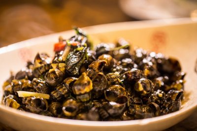 ​去壳田螺肉怎么做好吃？这样做，又香又辣，比猪肉好吃多了