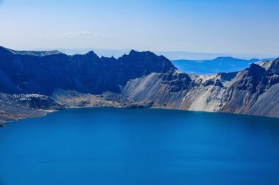 ​长白山天池真的有水怪是什么动物？目击者称：像恐龙、像大铁锅、像水牛