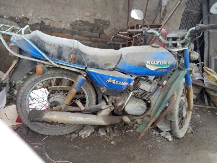 收拾乡下老仓房，发现多年的金城AX100，当初为买一台在井下挖煤两年